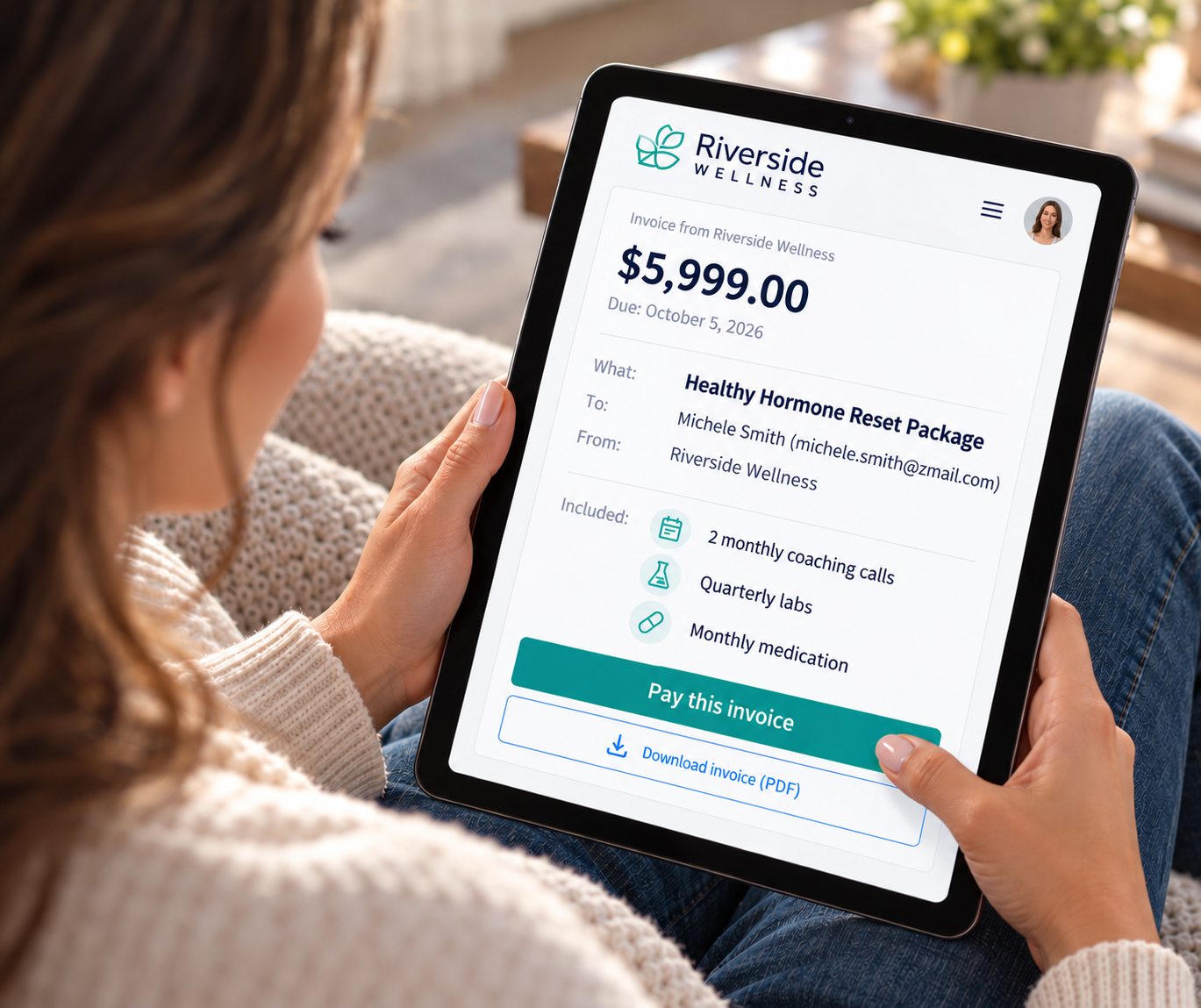 Patient viewing and paying a Riverside Wellness invoice on an iPad